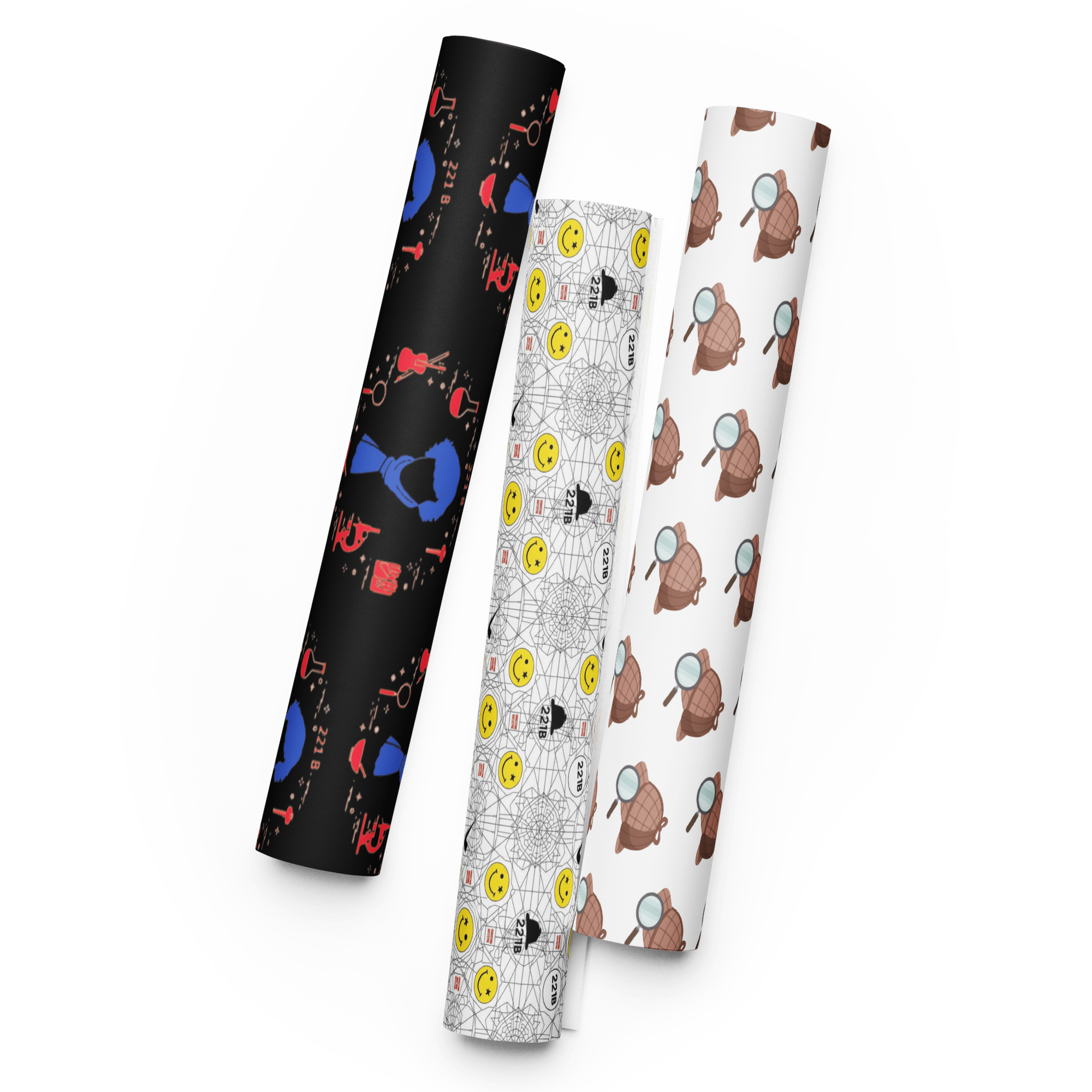 Set of three rolled fabric sheets with playful cartoon-style patterns in black, white, and brown.
