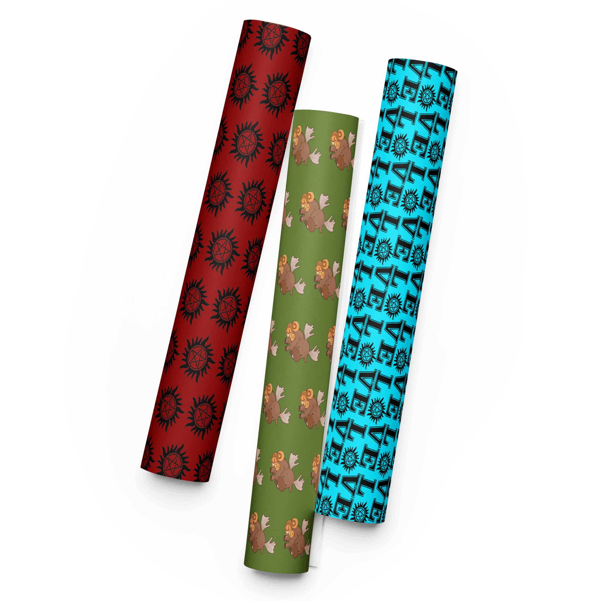 Three rolled fabric sheets featuring bold red, green, and teal patterns with repeating graphic designs.